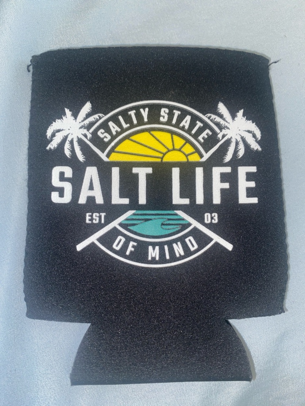 Salt Life Black Can Cooler with Yellow Sun & Teal Wave Logo